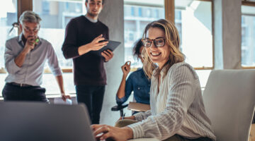 Female entrepreneur working on laptop