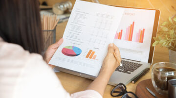 Woman holding a work report
