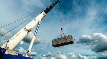 Truck and Crane in site for construction and blue sky