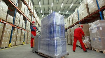 People working inside warehouse