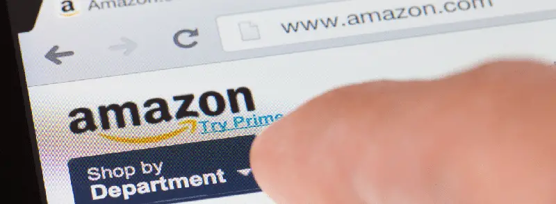 A zoomed in view of a shopper browsing on Amazon.com on their smart phone