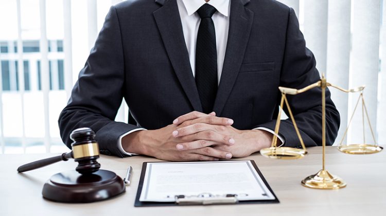 Professional male lawyers work at a law office