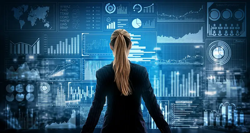 Businesswoman standing in front of  big data analytics on virtual screen