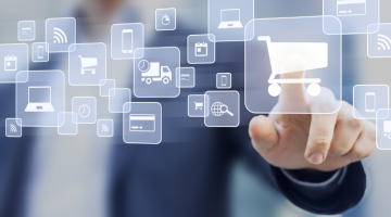 E-commerce concept with a person touching a button on a digital interface with icons