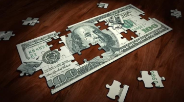 Hundred dollar bill in puzzle