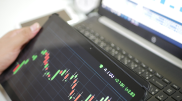 Businessman checking stock market data