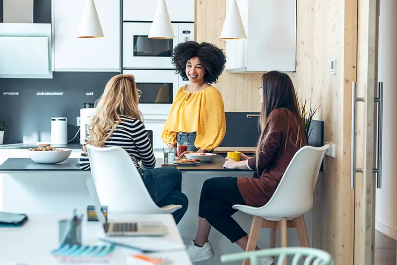 Three smart entrepreneur women talking while taking a break