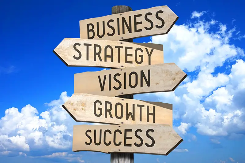 Wooden signpost - business growth