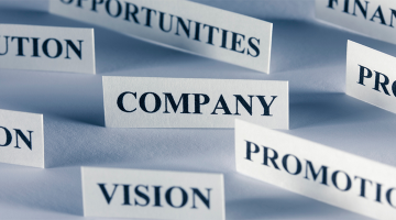 Company. vision. and opportunities on the white name plate label