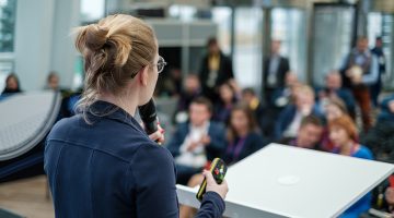 Woman leader speaks at pitch session