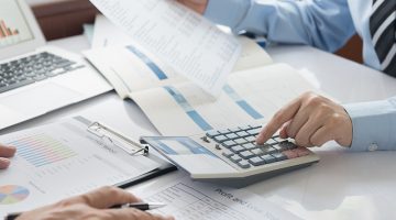 Business analyst team checking in financial statement for audit internal control system