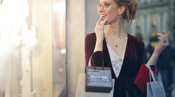 Woman carrying tote bags