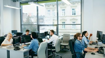 People Working In Modern Office.