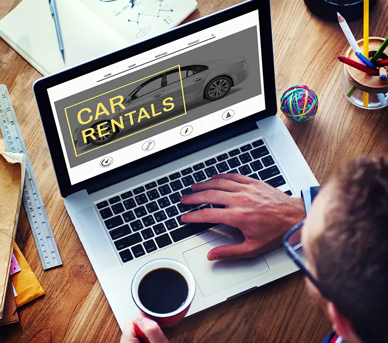 Car rentals on laptop screen