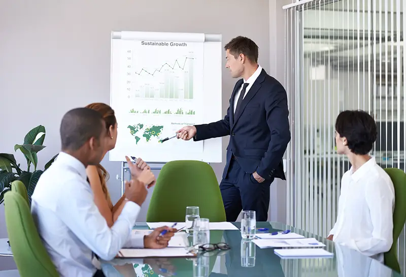 Shot of a businessman presenting data to his colleagues in the boardroom