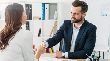Female client and male financial advisor