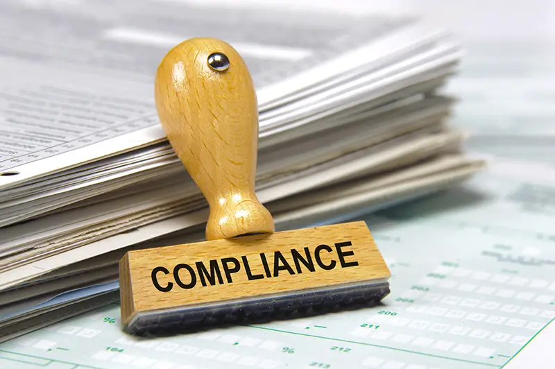 compliance marked on rubber stamp