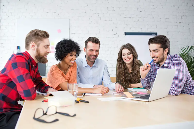 Group of creatives working on marketing agency