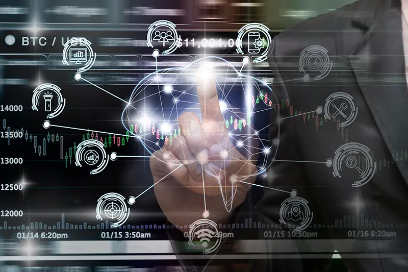 Businessman hand pointing the Polygonal brain shape of an artificial intelligence with various icon of smart city