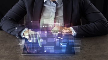 Business woman working on tablet with global data