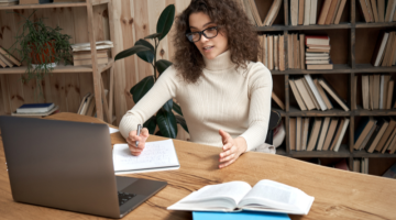 Yooung woman studying on online course