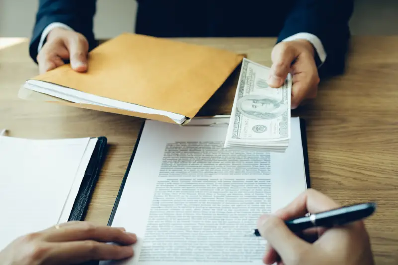 Businessman receiving money from his business loan