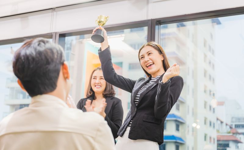 Business Woman Holding Award Trophy At Meeting Room, Celebration Success Happiness Team Concept