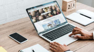 Person using website on laptop