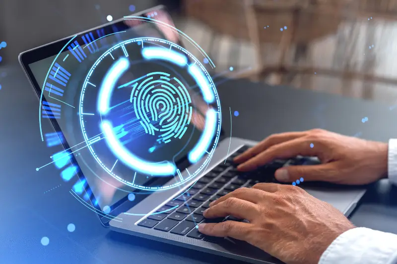 Man hands using laptop with fingerprint interface