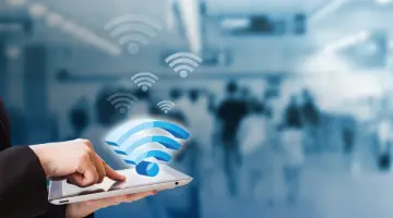 Businesswoman connecting to Wifi