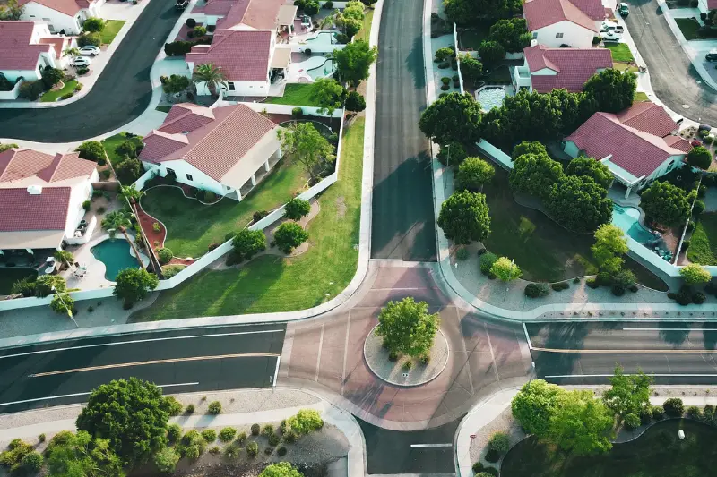 Drone shot looking forward in a suburb