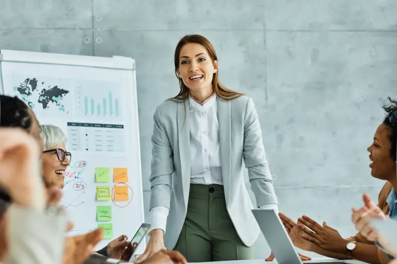 young business people meeting office teamwork group whiteboard presentation seminar woman businesswoman startup creative