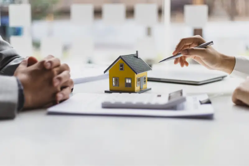 Businessmen, real estate agents discuss house purchase prices, fee, mortgage, interest, rent, cash flow, loan.