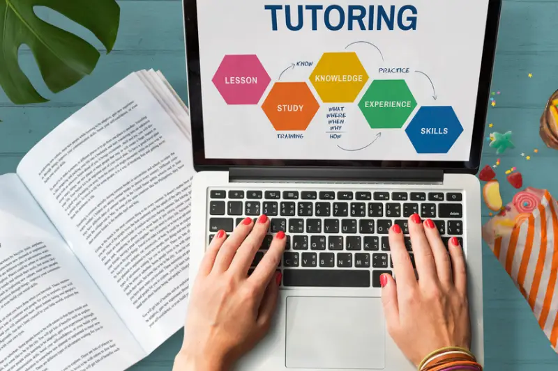 Woman using laptop for online studies