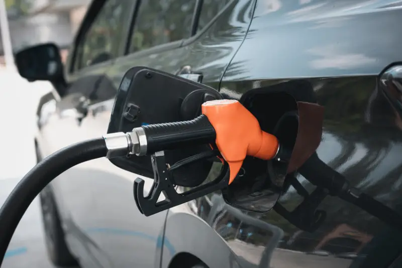 Gasoline being refilled at a petrol station