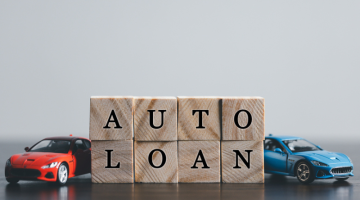 word AUTO LOAN writeen on wooden cubes