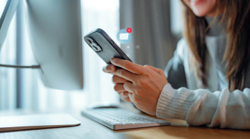 Woman hands using smartphone with 1 new email alert sign icon pop up, Female using phone for check email for work or sending text SMS short message at home, Online communication concept