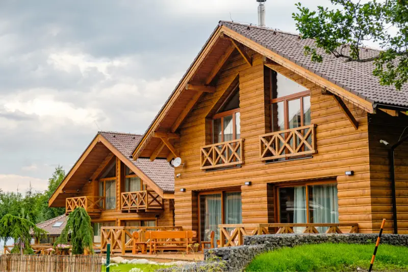 Modern wooden house with big windows in the suburb