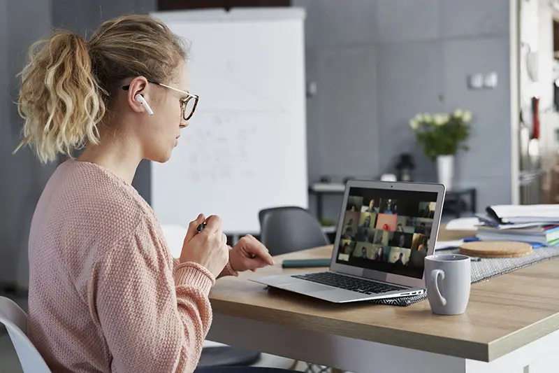 Woman attending an online conference