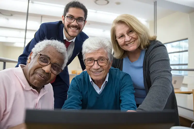 Senior individuals with smiles on their faces