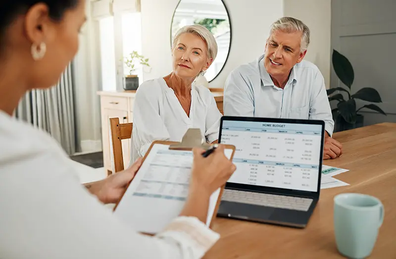 Retirement, couple and accountant with finance documents for budget review and payment planning