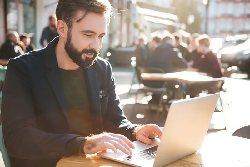 Man working on laptop computer