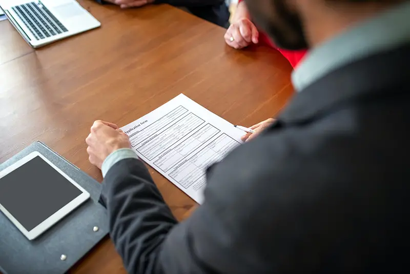 Insurance agent talking to his client