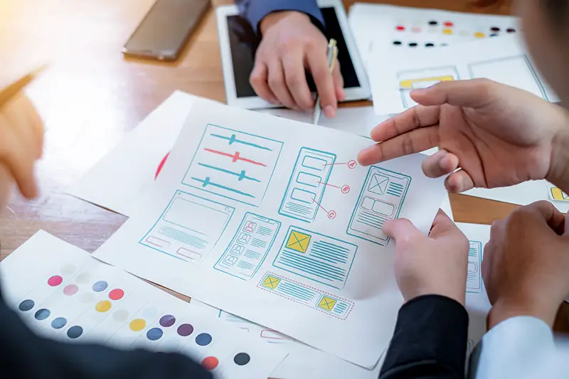 Teamwork graphic designers creative drawing website ux app development