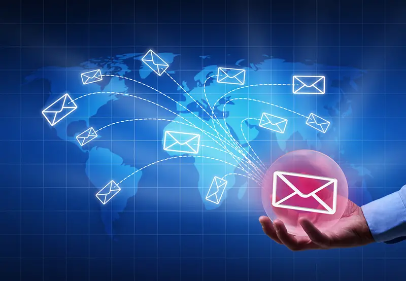 Distributing information in a digital world concept - bubble radiating mail envelopes
