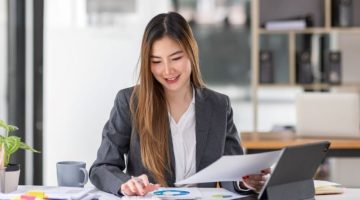 Businesswoman or accountant working Financial investment on calculator, calculate, analyze business