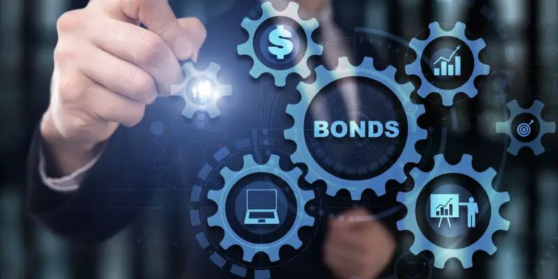 Businessman clicks inscription bonds