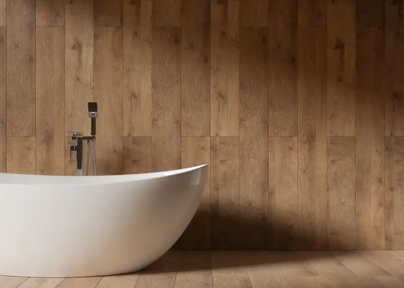 Beautiful and modern bathroom. White bathtub.