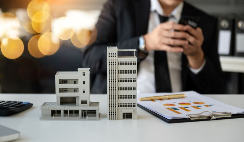 Customers who choose to buy a condominium room and a bank approve a loan for their purchase.