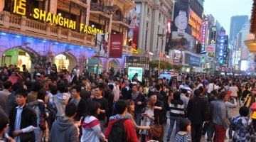 Tourists crowd the Nanjing Road shopping street in Shanghai China